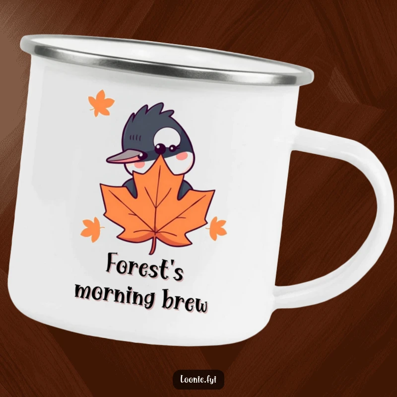 Funny camping mug showcasing a curious loon peeking behind a maple leaf, perfect for enjoying drinks outdoors with humor.