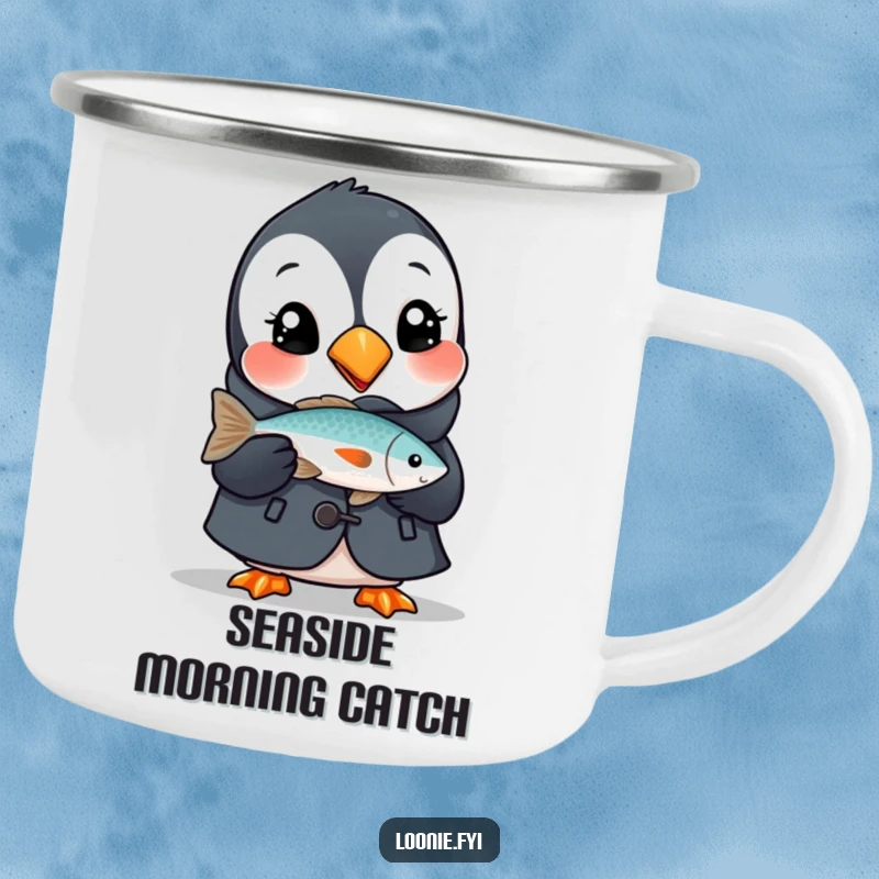 Funny camping mug featuring a delighted puffin in a tiny coat, holding a fish, ideal for enjoying drinks during outdoor adventures.