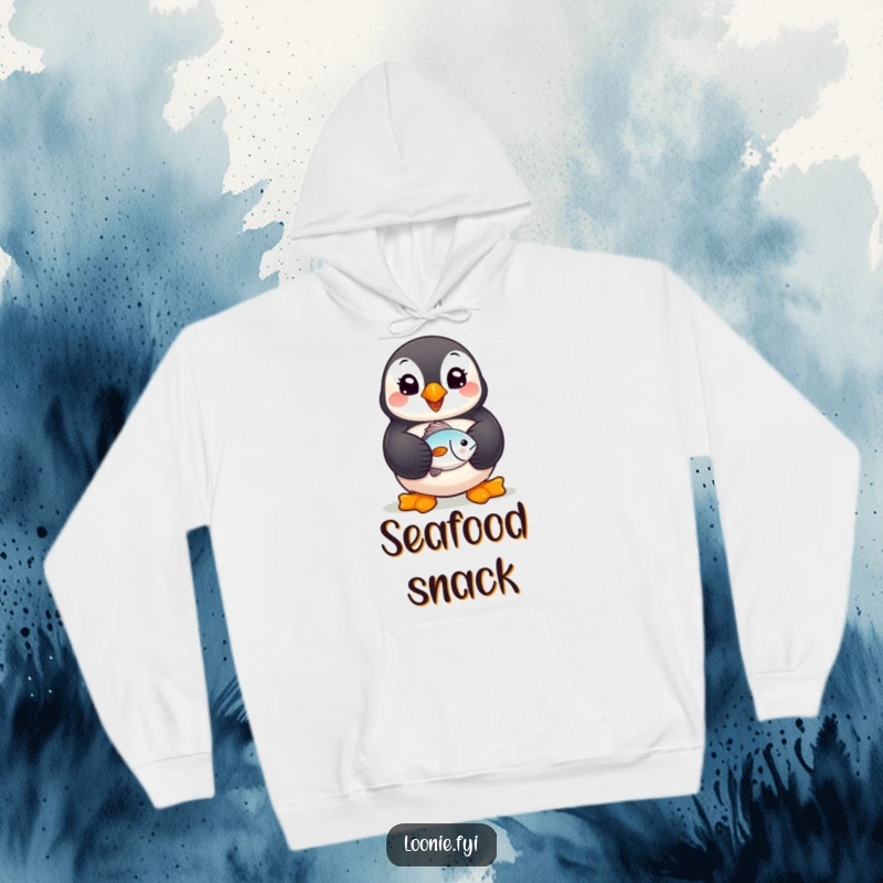 Funny Puffin Hoodie: A cheerful puffin bird proudly holding a small fish, offering cozy comfort and a touch of seaside humor.
